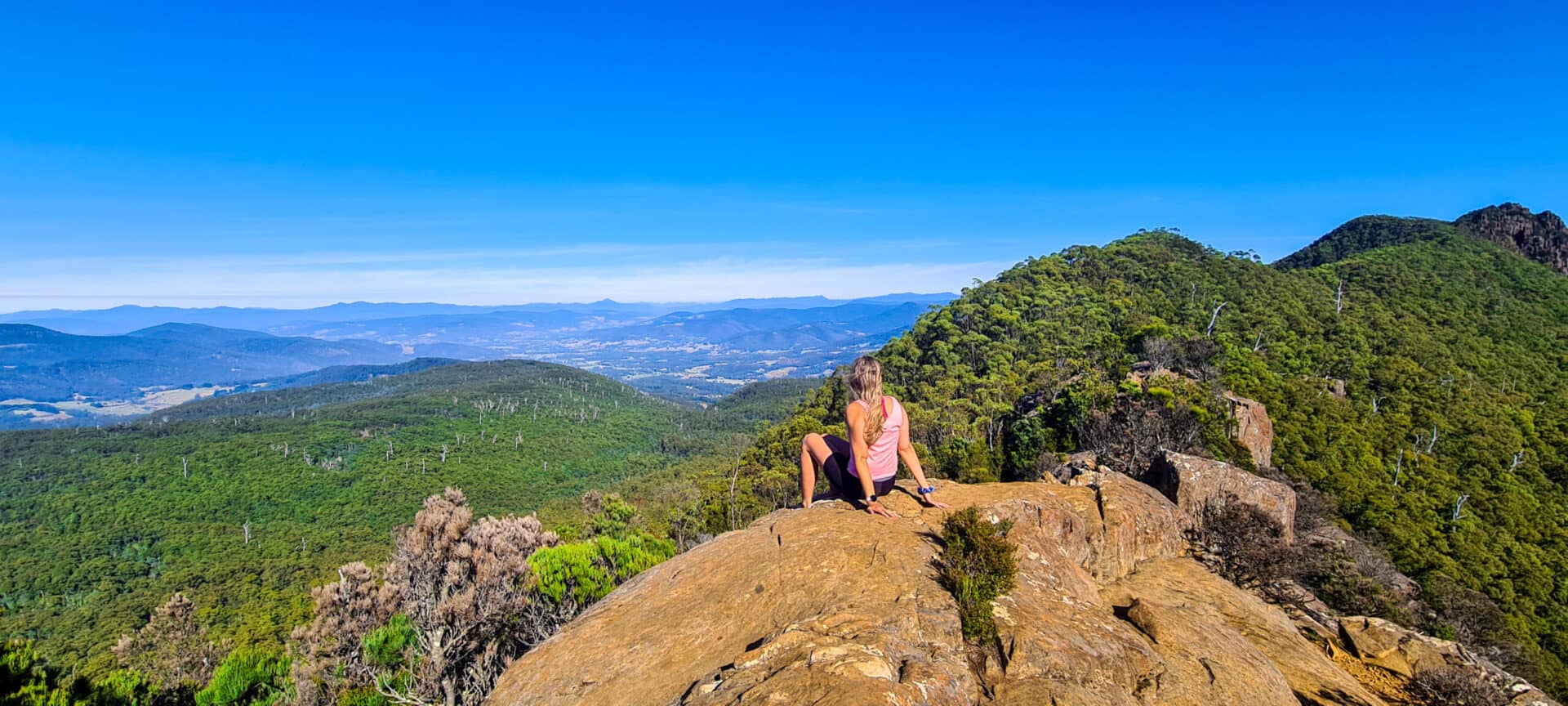 Hiking the Beautiful Cathedral rock- Naomi sitting on top of cathedral rock